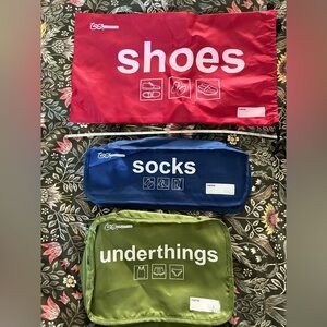 Red, Blue, and Green Travel Organizers (box 1)